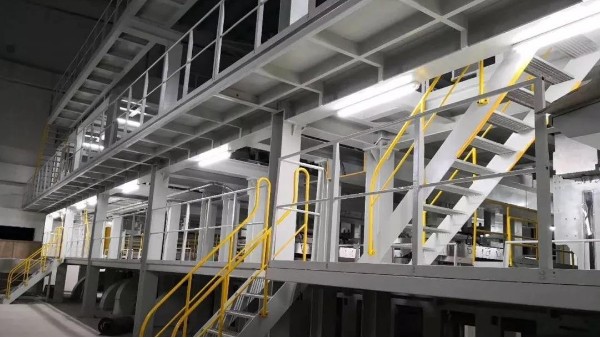 紡熔生產(chǎn)線上卷繞機的輔助設備